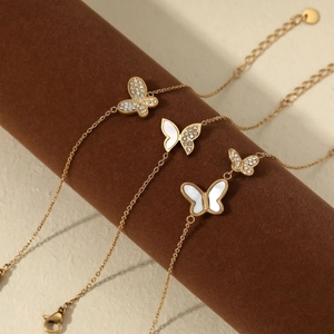 Elegant gold butterfly bracelet set with sparkling crystals and shell inlay for women
