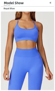 Detail of royal blue high-elastic ribbed yoga bra and high-waist leggings on model