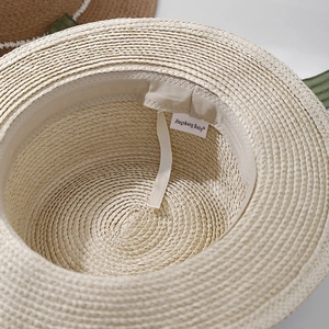 Straw sun hat for children with adjustable inner strap and breathable sweatband