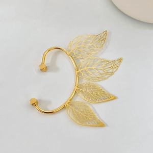 Golden hollow leaf ear cuff with fairy wing design for non-pierced ears in vintage style