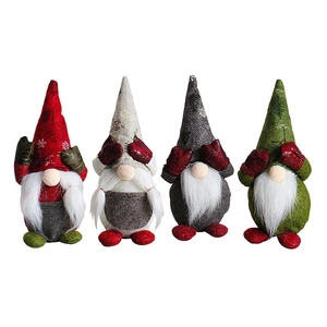 Set of four cute plush Christmas gnomes in red, beige, grey, and green for holiday decor