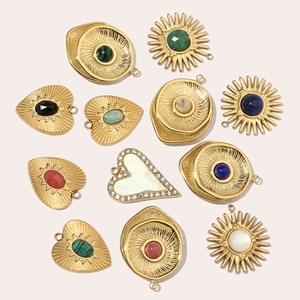 Set of 12 vintage gold heart and sun pendants with colorful natural stone inlays
