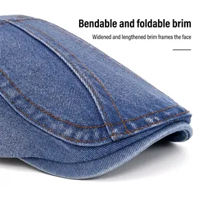 Vintage blue denim beret with wide foldable brim and orange contrast stitching detail