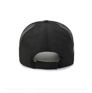 Rear view of black mesh baseball cap showing breathable fabric and velcro strap
