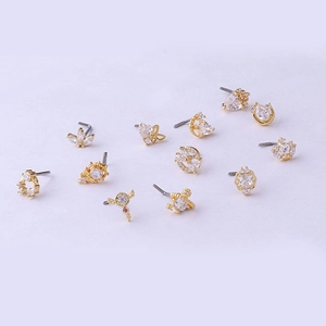 Set of 20G gold titanium steel nose studs with crystal heart and crown designs