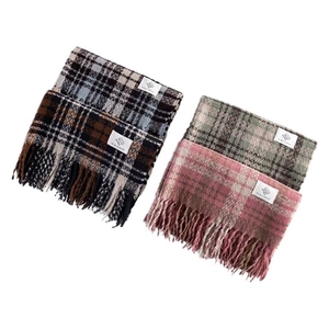 Plaid tassel scarves in rose pink and earthy tones with soft wool-like texture