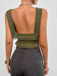 Detailed back view of army green mesh camisole with backless design and ruffle trim