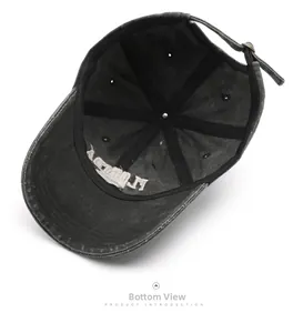 Detailed interior view of vintage washed cotton baseball cap with adjustable metal buckle