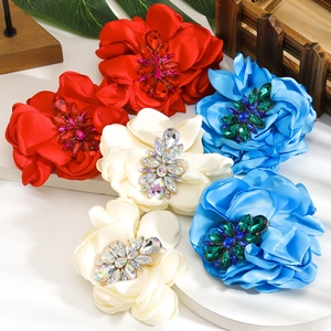Exaggerated fabric camellia drop earrings with rhinestones in red white and blue