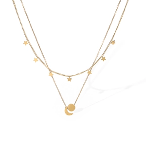 Detail of 18K gold double layer necklace featuring delicate star and moon pendants