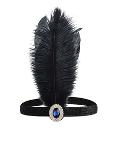 Detail of 1920s black feather headband with navy gemstone and gold buckle ornament