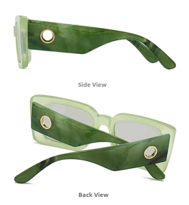 Detail view of green marble pattern rectangle sunglasses with gold round metal accents
