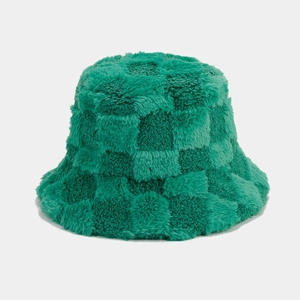Detail of emerald green plush bucket hat featuring a classic checkerboard texture
