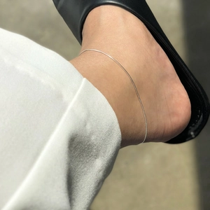 S925 Sterling silver thick snake chain anklet worn on ankle by female model