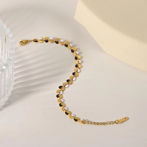 18K gold plated stainless steel heart link bracelet with black and white enamel detail