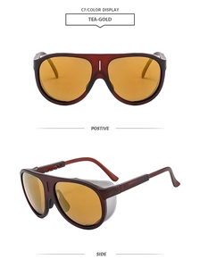 Detail view of tea-gold aviator sunglasses with thick frames and side shields