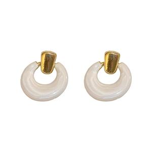 Minimalist white and gold circular drop earrings for women with elegant resin finish