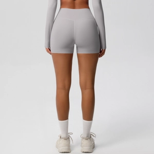 Close-up of high-waist yoga shorts showing the lifted butt effect and gray brushed fabric