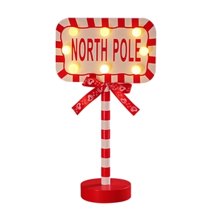 LED wooden North Pole stop sign Christmas decoration with red bow and striped pole