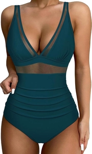 Detail of teal one-piece swimsuit featuring mesh panels and ruched tummy control design