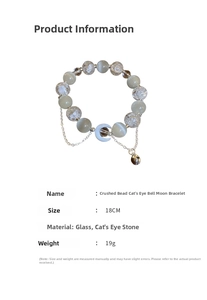 Detail of moon pendant bracelet featuring cat eye stone beads and glass crushed stones