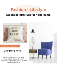 Modern purple armchair styled with a gold-printed Merry Christmas festive cushion cover