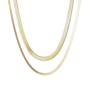 Elegant gold titanium steel snake bone necklace with a flat textured vintage design