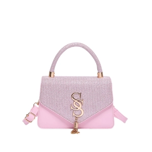 Chic pink crossbody bag with glitter texture, gold S-logo buckle and hanging tassel