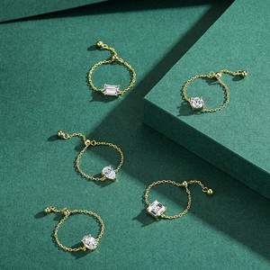 Set of 5 adjustable gold chain rings with sparkling zircon crystals in various shapes