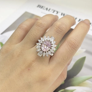 Detailed view of S925 silver ring featuring pink oval stone with marquise-cut petals