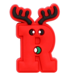 Detail of Christmas themed red letter R shoe charm with reindeer antlers for clogs