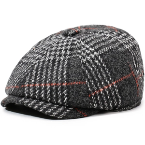 Classic dark grey plaid beret cap with red stitching accents shown from 45-degree angle