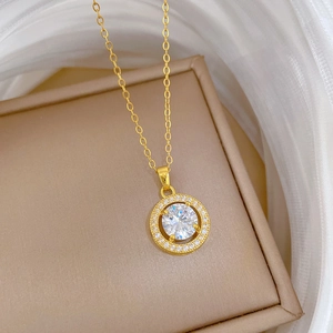 Elegant gold titanium steel necklace with circular hollow cubic zirconia pendant