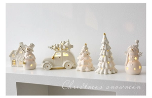 Set of 6 white ceramic glowing Christmas ornaments including house, snowman and trees