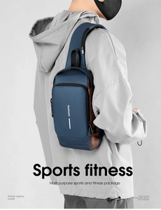 Detail of adjustable strap and side zipper on a blue water-resistant chest bag