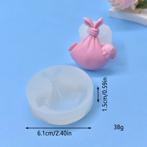 Sleeping baby silicone mold with pink newborn figure and precise dimension measurements