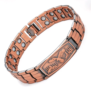 Detail view of bronze magnetic bracelet showing eagle relief and interior magnets