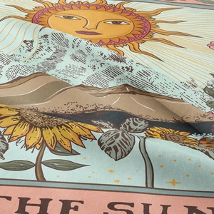Bohemian tarot tapestry featuring vintage sun and sunflower patterns on fabric background