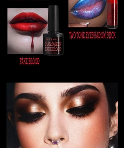 Detail von Halloween Kunstblut und zweifarbigem Glitzer-Lidschattenstift im Make-up Set