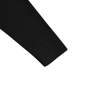 Detailed macro shot of a black long sleeve shirt cuff with fine double-stitch sewing
