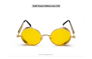 Detail of steampunk sunglasses showing golden metal frames with intricate side carvings