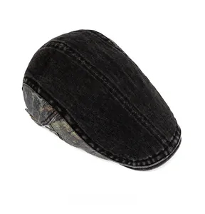 Top view of washed black denim ivy cap with camouflage patchwork side detail