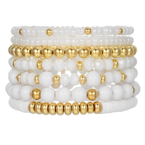 Detailed view of 7-piece acrylic crystal bead bracelet set in white and gold colors