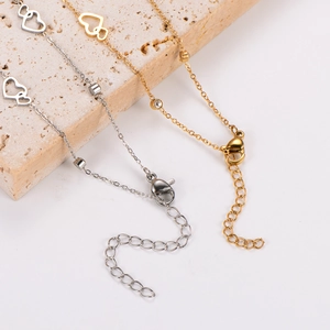 Minimalist stainless steel double heart anklet with small crystals in gold and silver finish