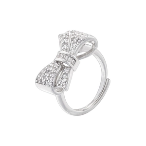 Detail of silver bow ring with micro-pave cubic zirconia and adjustable open band