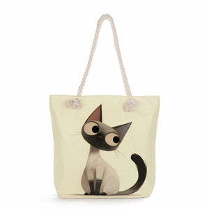 Detail of canvas tote bag showing Siamese cat print and thick cotton rope handle knots