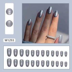 Oval silver grey press-on nails with metallic mirror finish and silver glitter accents