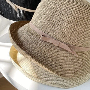Handwoven straw sun hat for women with ribbon bow, elegant French style summer beach cap