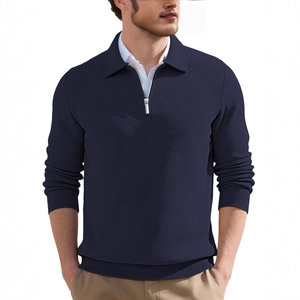 Men's navy vintage quarter-zip sweater with geometric knit texture and polo collar