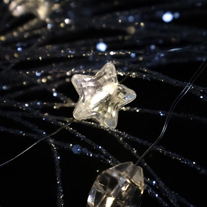 Star-shaped warm white LED string light with silver copper wire for Christmas decor